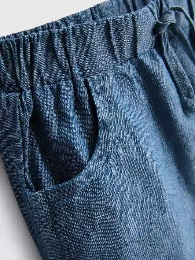 0–12 måneder | Sett med stripete strikket polokjortse og shorts