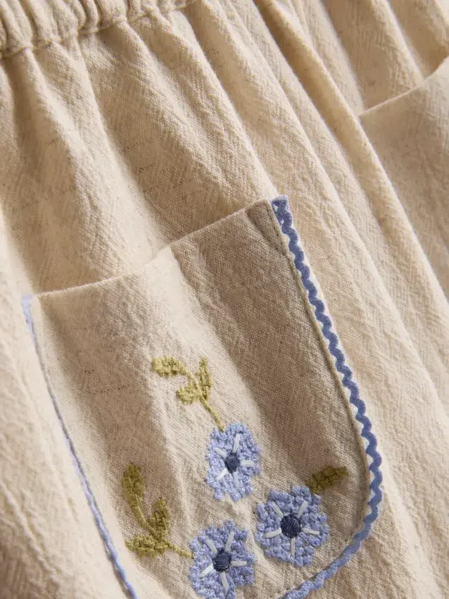 0–36 måneder | bukser med blomsterapplikasjon og rette ben