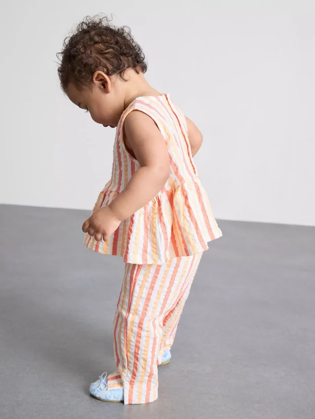 0–36 måneder | Stripet peplum-top og bukser-sett