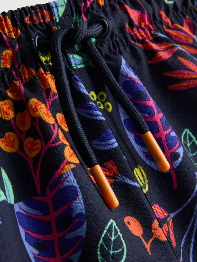 1,5–7 år | badeshorts med blomstertrykk