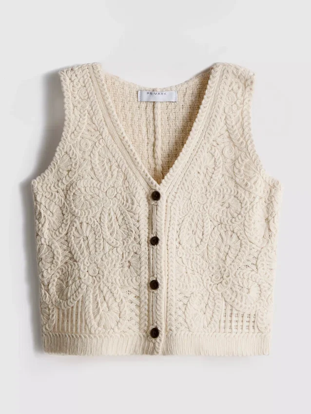 1,5–8 år | heklet vest med knapper foran
