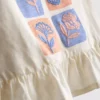 1,5–8 år | Sett med brodert peplum-top og bukser