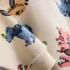 1,5–8 år | Sett med genser og joggebukse med dinosaurmotiv