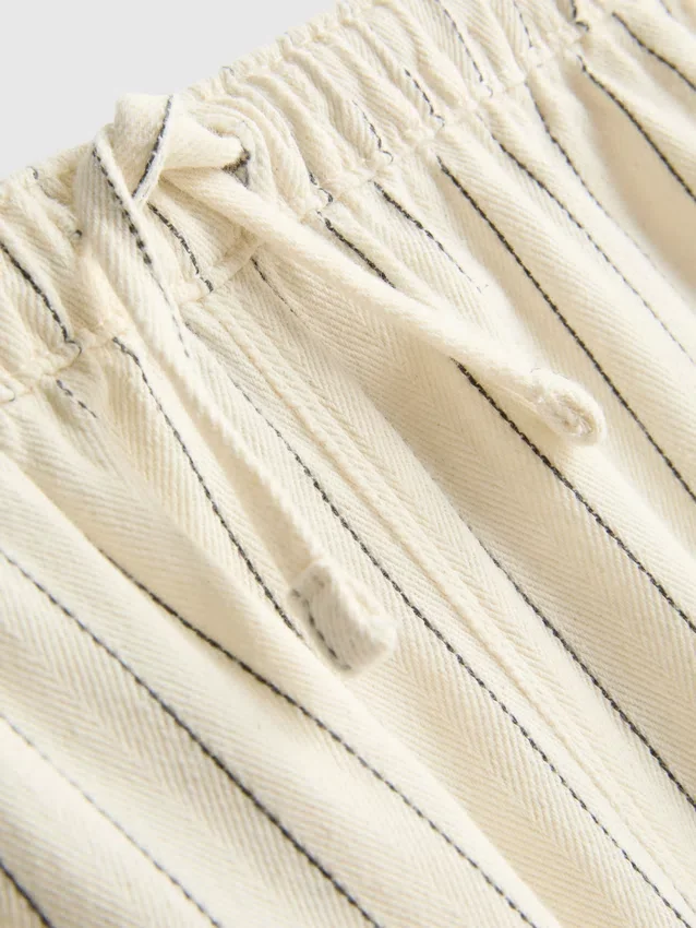 1,5–9 år | Jeans med smale striper og vide ben