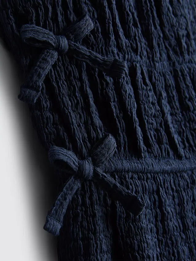 1,5–9 år | jumpsuit med sløyfe