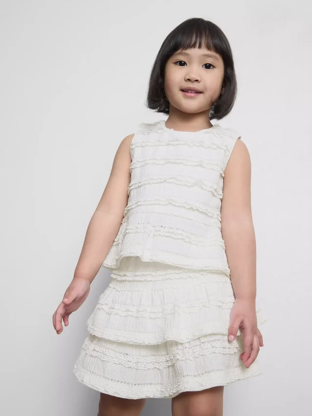 1,5–9 år | peplum-bluse uten ermer