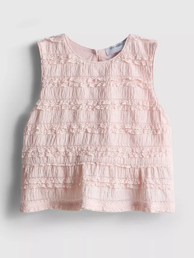 1,5–9 år | peplum-bluse uten ermer