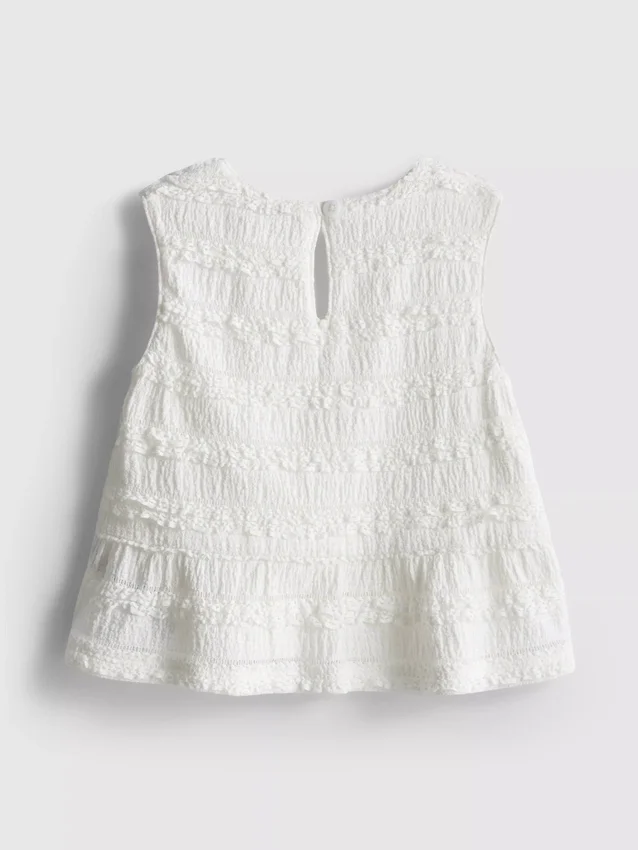 1,5–9 år | peplum-bluse uten ermer