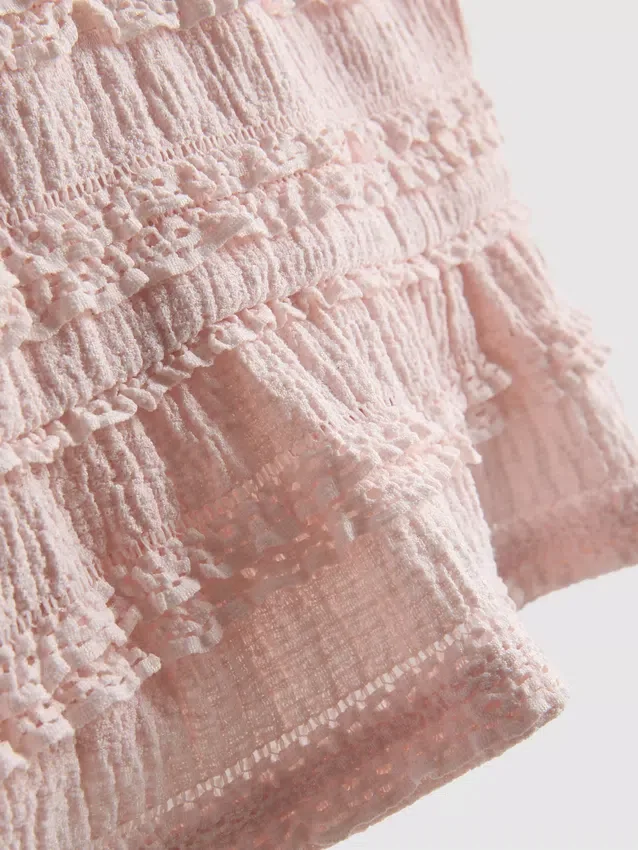 1,5–9 år | peplum-bluse uten ermer