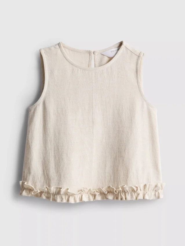 1,5–9 år | Ruffle-bluse uten ermer