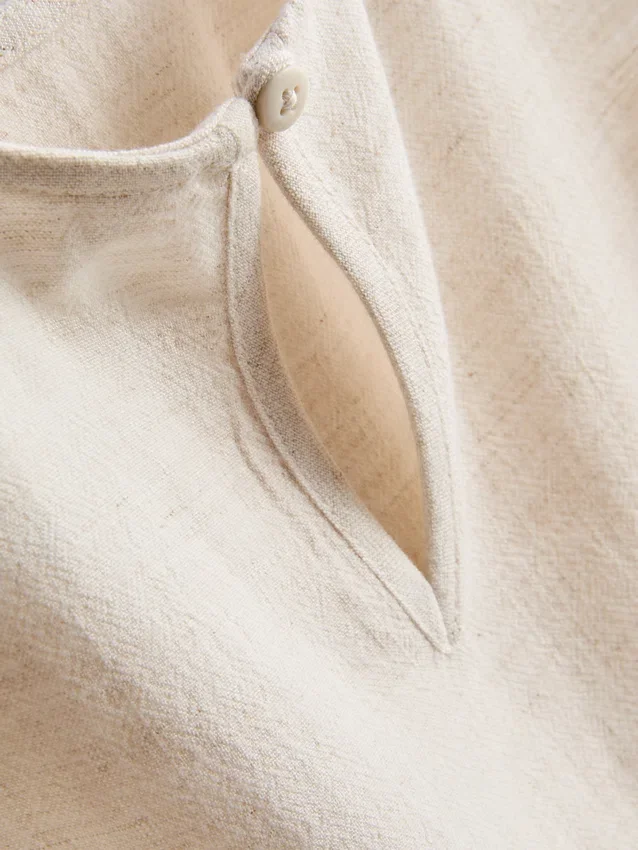1,5–9 år | Ruffle-bluse uten ermer