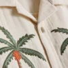 1,5–9 år | T-skjorte med brodert palme