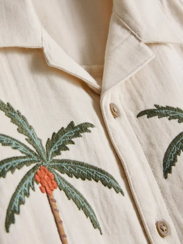 1,5–9 år | T-skjorte med brodert palme