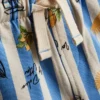 1–9 år | Dolce Vita-sett med T-skjorte med grafisk trykk og shorts