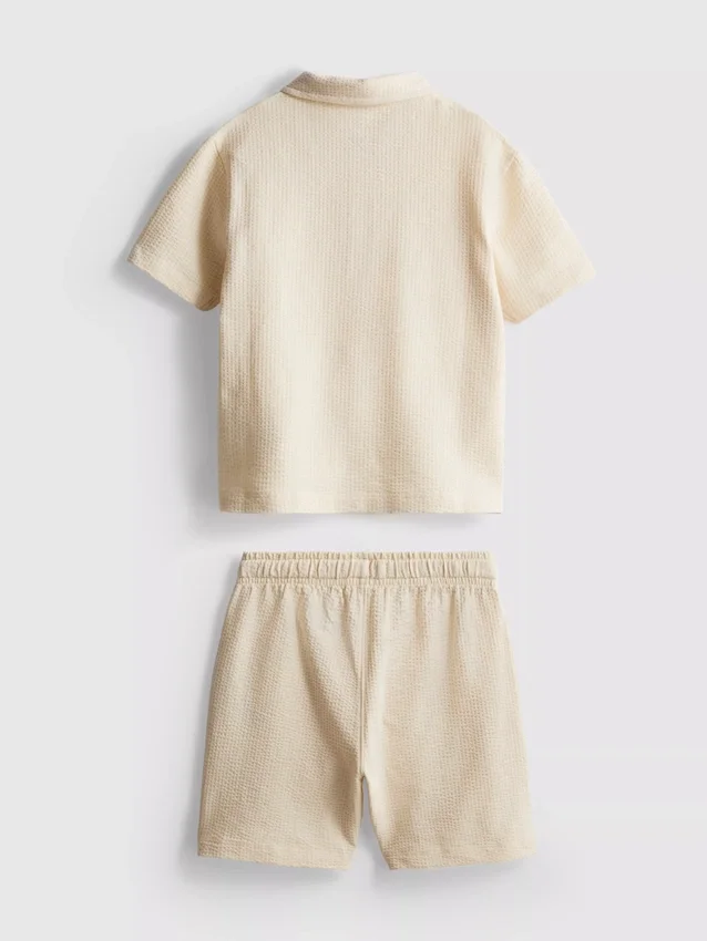 1–9 år | sett med strukturert poloskjorte og shorts