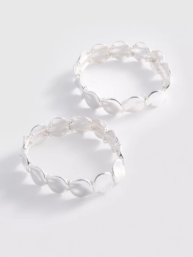 2-pakning med armbånd i smeltet metall