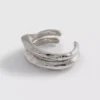 2-pakning med armbånd i smeltet metall