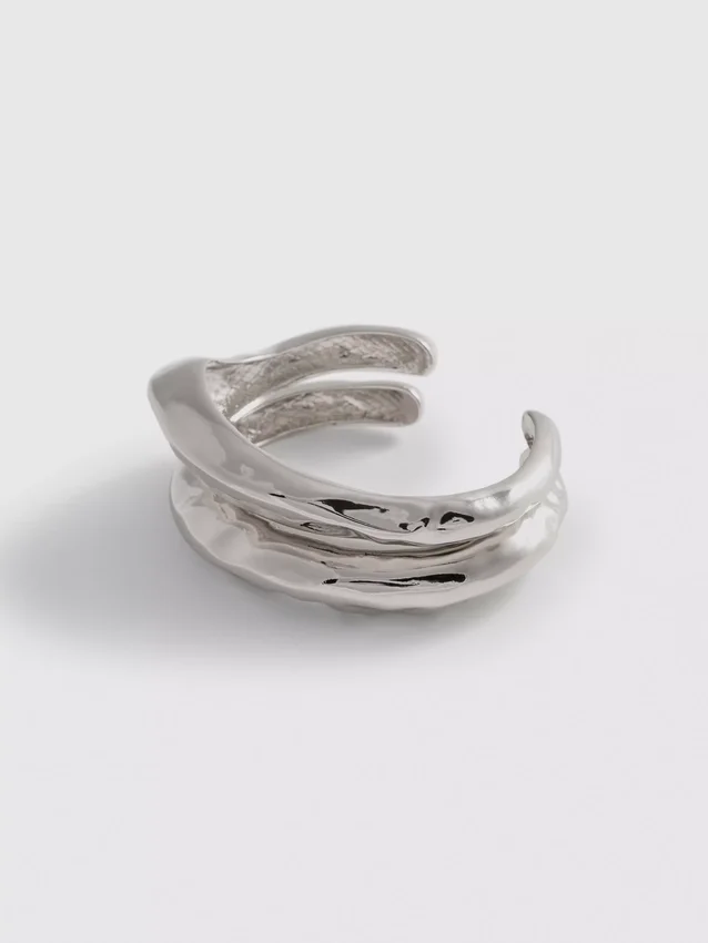 2-pakning med armbånd i smeltet metall