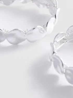 2-pakning med armbånd i smeltet metall