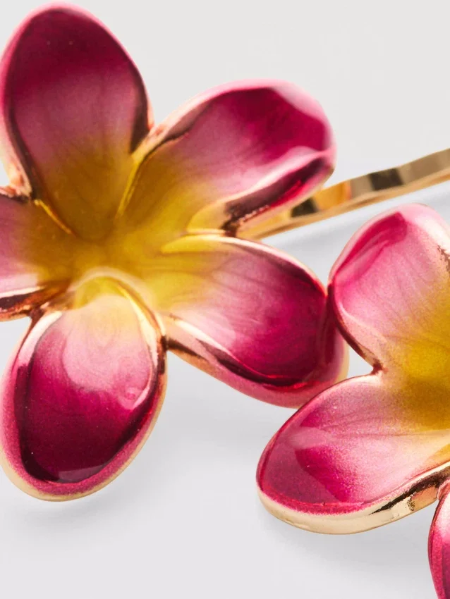 2-pakning med blomsterformede hårspenner