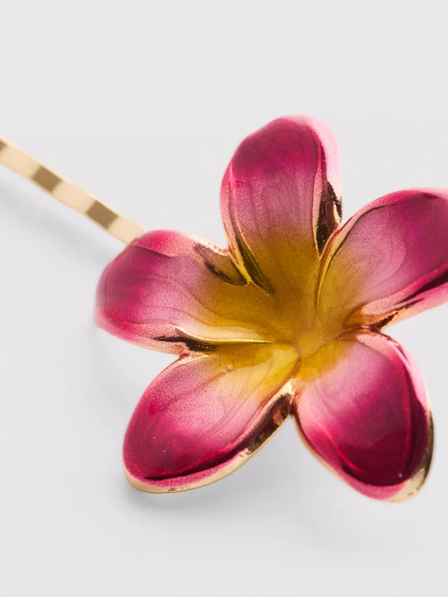 2-pakning med blomsterformede hårspenner