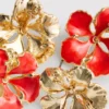 2-pakning med blomsterøreringer