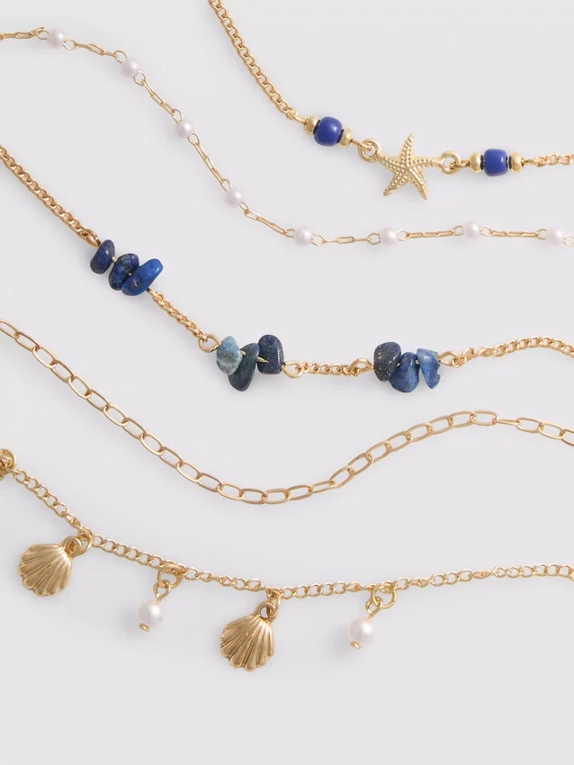 6-pakk med choker-kjeder med havmotiver