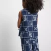 7–15 år | brodert ermeløs bluse