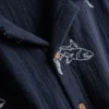 7–15 år | brodert skjorte med knapper