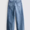 7–15 år | Jeans med brede ben og brodert blomsterbue