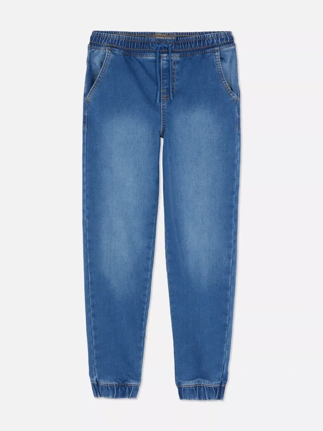 7–15 år | Jeans med oppbrettede bukseben