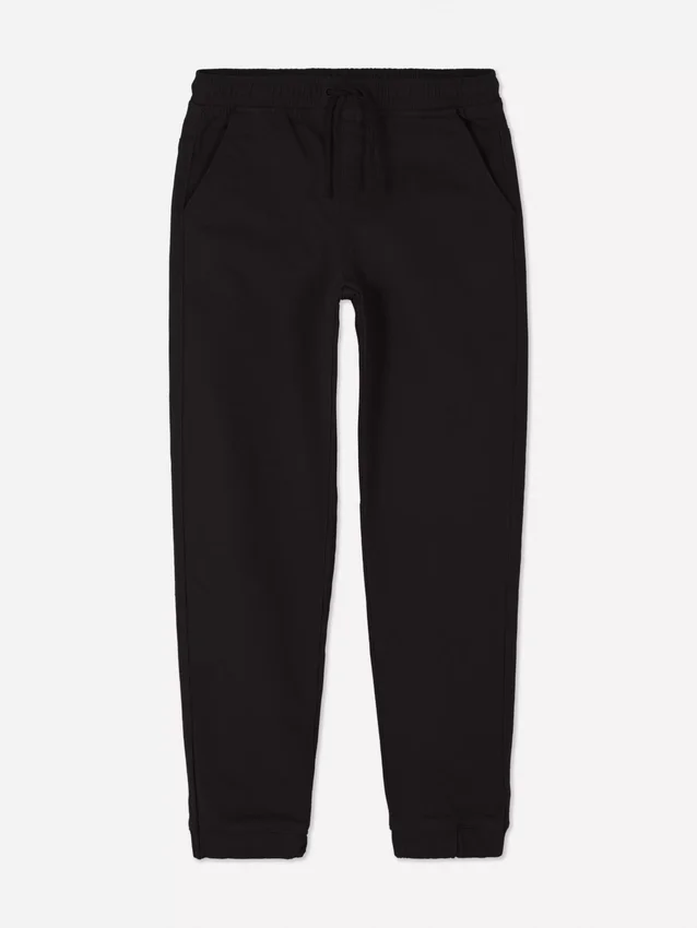 7–15 år | Jeans med oppbrettede bukseben