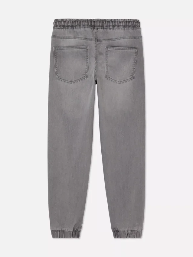 7–15 år | Jeans med oppbrettede bukseben