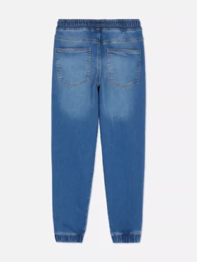 7–15 år | Jeans med oppbrettede bukseben
