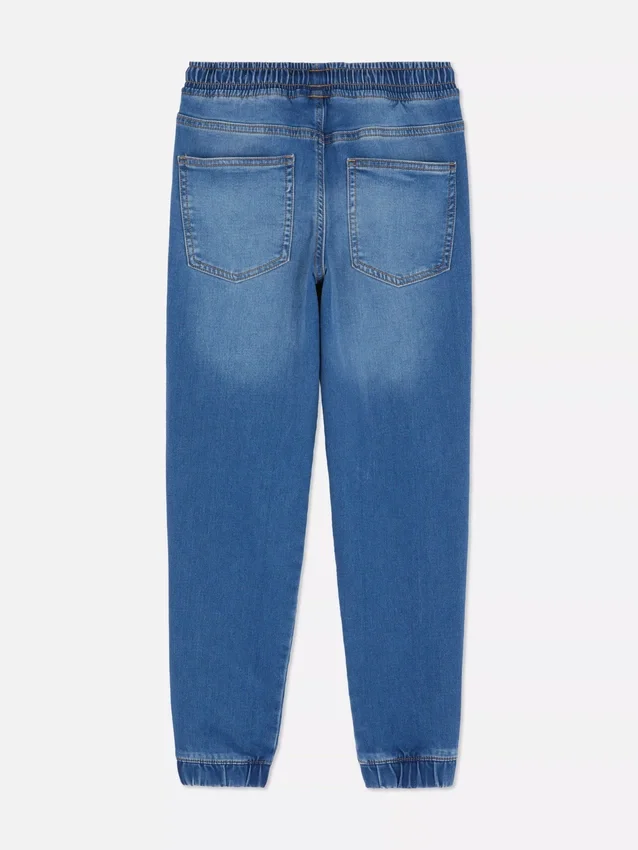 7–15 år | Jeans med oppbrettede bukseben
