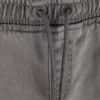 7–15 år | Jeans med oppbrettede bukseben