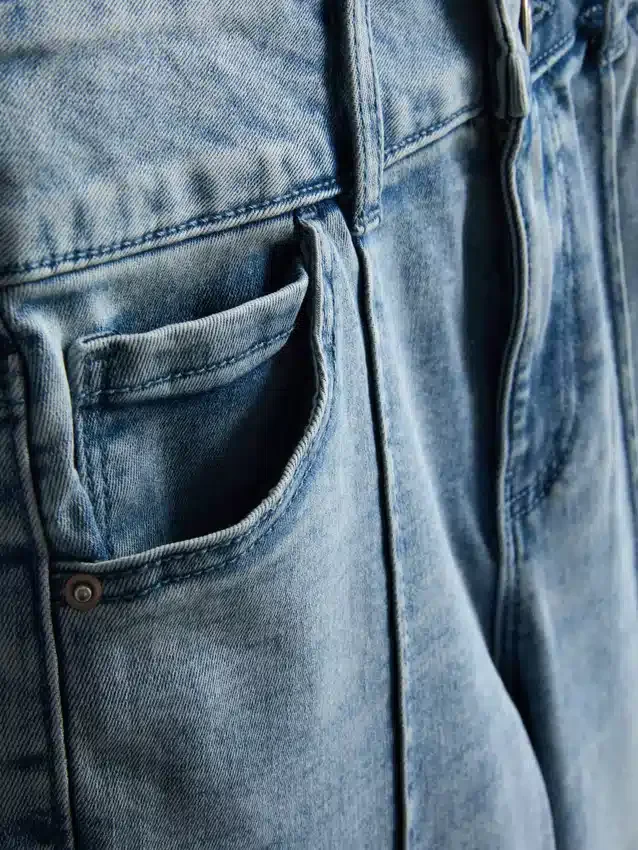 7–15 år | Jeans med pintuck og utvidet ben