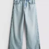 7–15 år | Jeans med splitt i buksebenet og vide ben