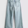 7–15 år | Jeans med splitt i buksebenet og vide ben