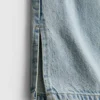 7–15 år | Jeans med splitt i buksebenet og vide ben