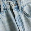 7–15 år | Jeans med splitt i buksebenet og vide ben