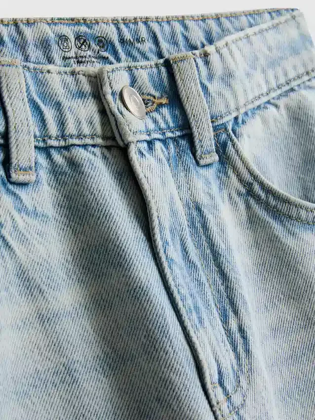 7–15 år | Jeans med splitt i buksebenet og vide ben