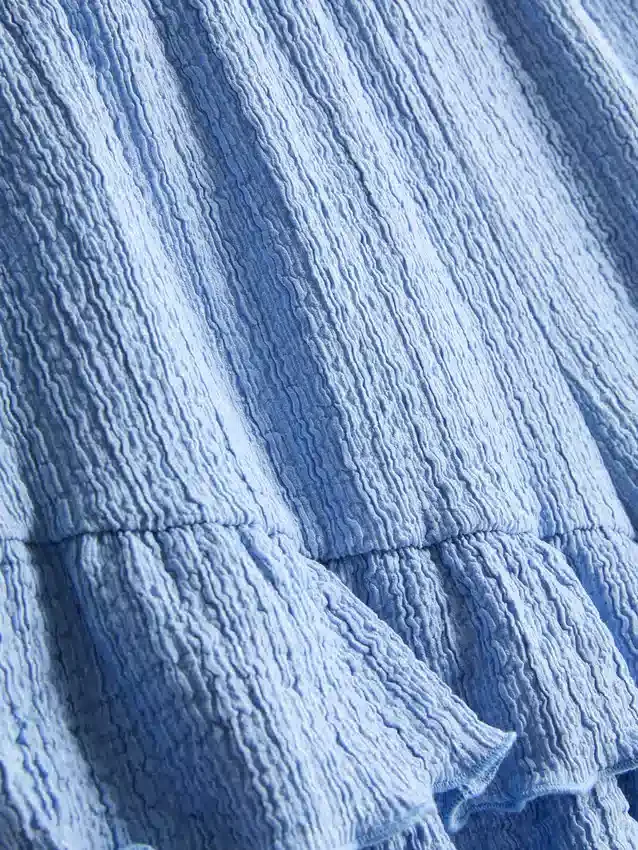 7–15 år | krøllete shorts med lag på lag
