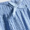 7–15 år | krøllete shorts med lag på lag