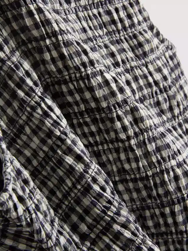 7–15 år | rynket, ermeløs kjole i gingham