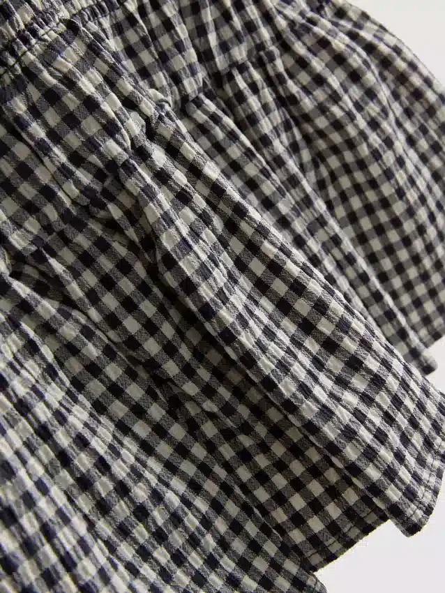 7–15 år | rynket, ermeløs kjole i gingham