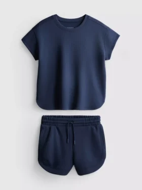 7–15 år | Sett med boksformet T-skjorte og løpeshorts