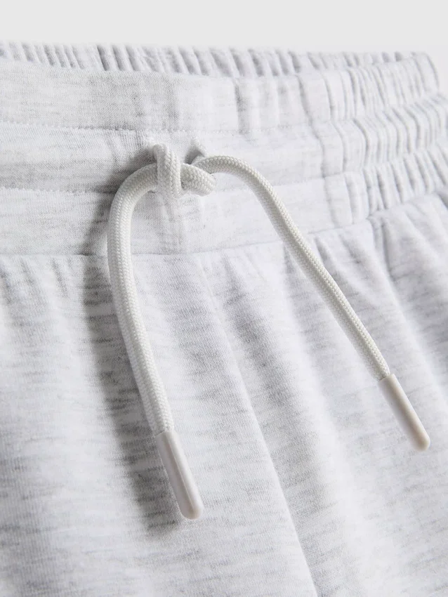 7–15 år | sett med genser og løpeshorts