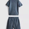 7–15 år | sett med strukturert kortærmet skjorte med knapper og shorts