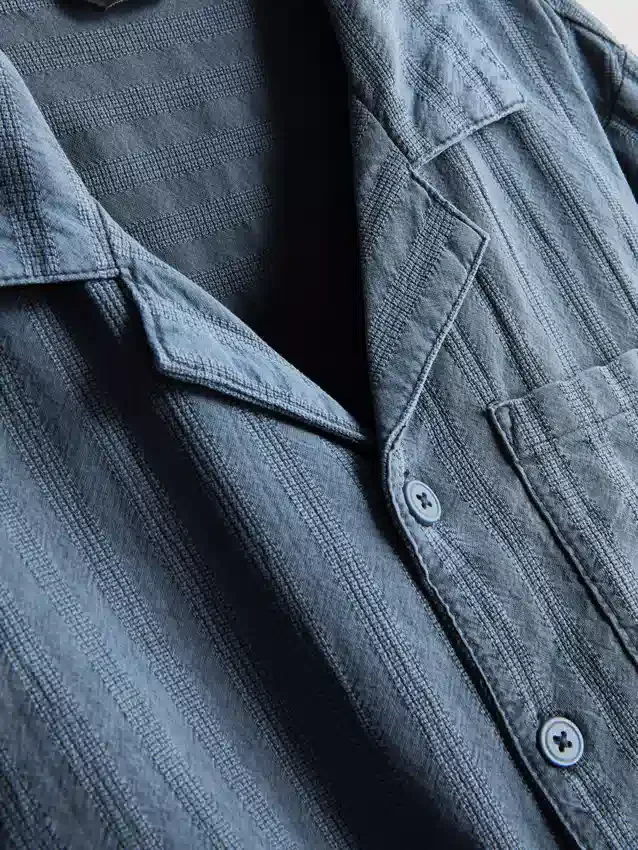 7–15 år | sett med strukturert kortærmet skjorte med knapper og shorts